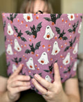 Monster Party reversible fabric book cover, front view showing colorful monster print